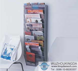 Wire mesh wall mounted magazine rack