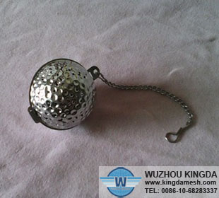 Perforated tea strainer with chain