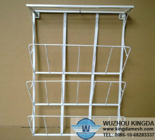 Wire magazine rack wall