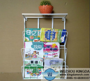 Wire magazine rack wall