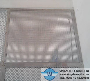 Perforated metal fence