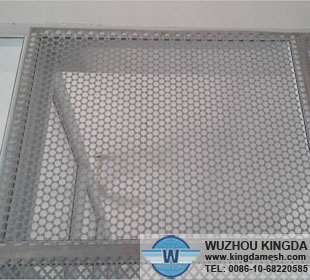 Perforated metal fence