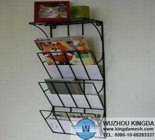 Wire magazine rack wall