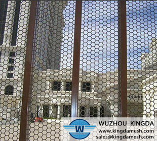 Perforated metal mesh fence