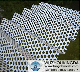 Perforated corrugated metal panel